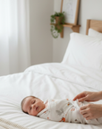 newborn baby swaddled in bamboo swaddle 