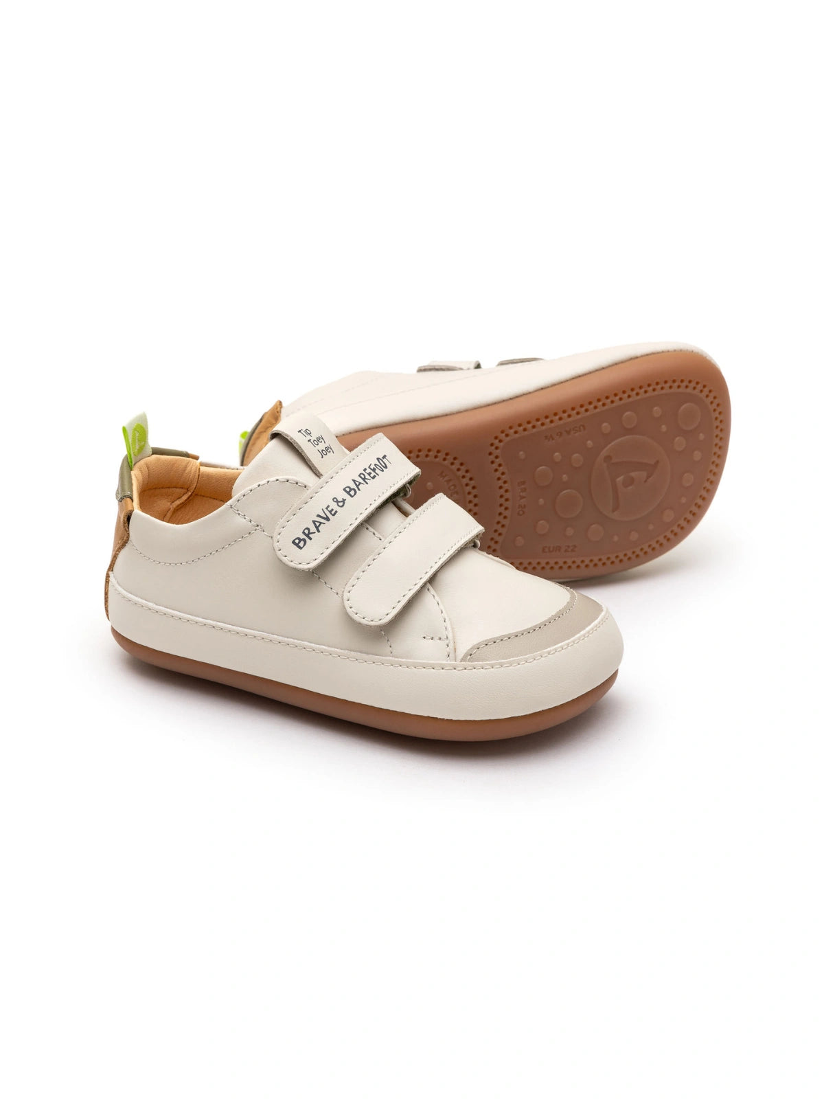 Tip Toey Joey Brave baby sneakers in Tapioca leather with double velcro straps and flexible brown soles.