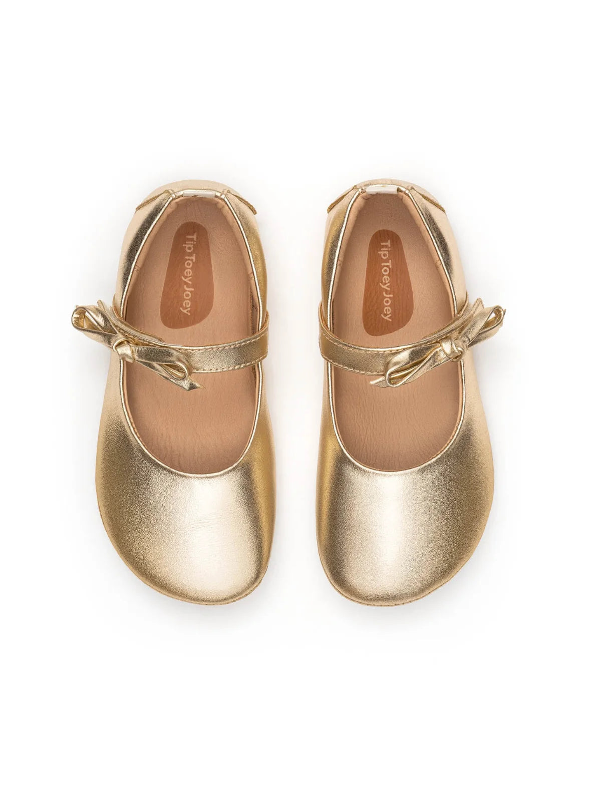 Top-down view of metal gold Brigitte Mary Janes highlighting the wide toe box and delicate strap detail.
