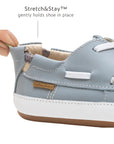 Close-up of the Stretch & Stay elastic heel on the Tide Blue baby shoe for a secure and comfortable fit.
