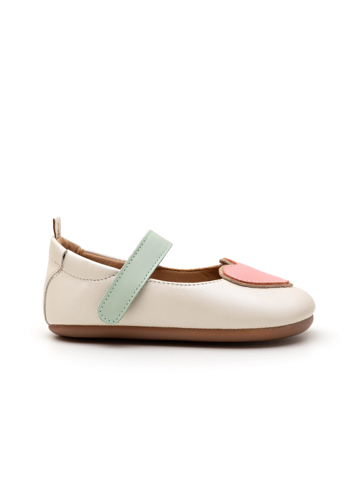 Side view of the antique white Heart Mary Jane for babies, showing the slim flat sole and premium leather finish.