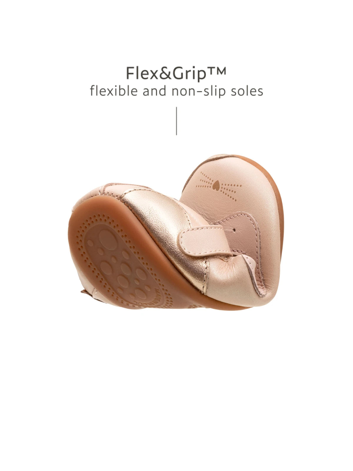 Demonstrating the flexible FlexiGrip sole on the candy dream baby kitten shoe, designed for natural foot movement in toddlers.
