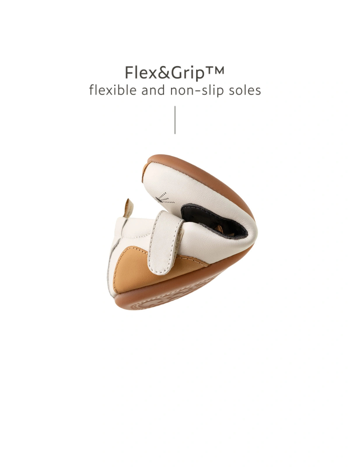 Demonstrating the ultra-flexible FlexiGrip sole on the Tapioca kitten baby shoe, designed for natural movement during first steps.