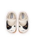 Overhead view of the Tapioca and Black baby kitten shoes, highlighting the anatomical shape for healthy foot development.