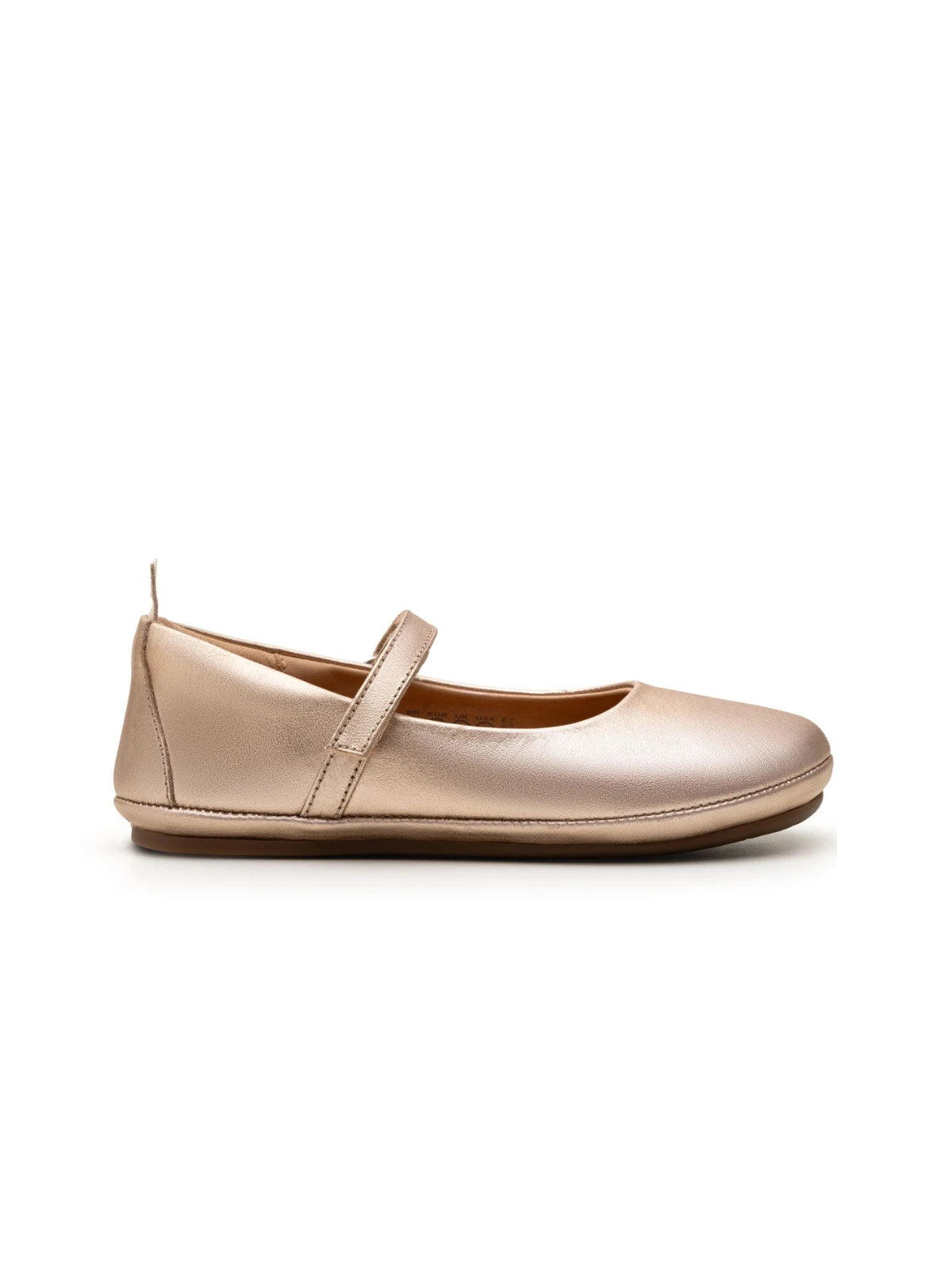 Side profile of the kids metallic salmon Marie shoe, showing the slim flat sole and premium leather finish.