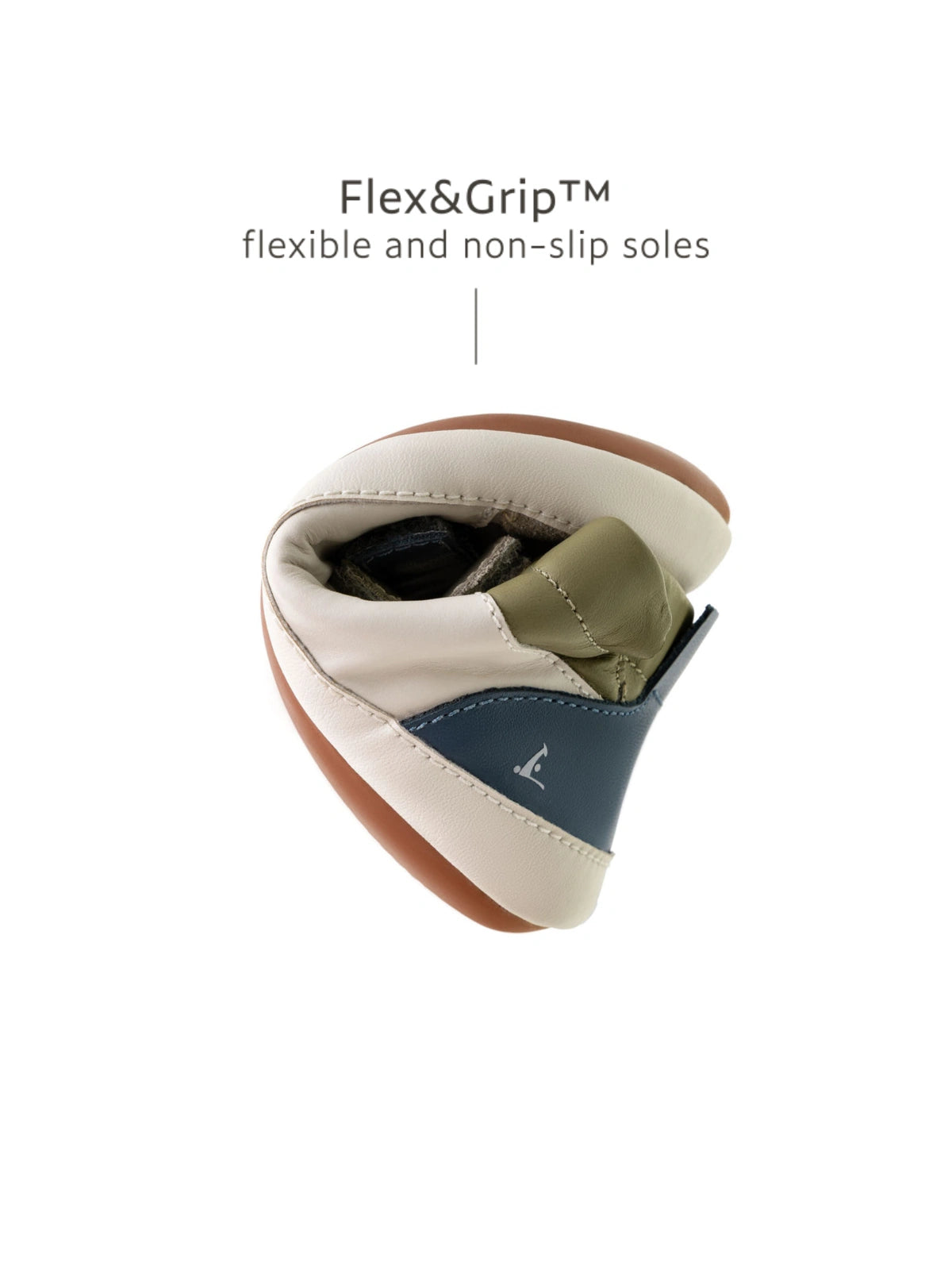 Demonstrating the flexible FlexiGrip rubber sole on the baby Metropoly leather high-top sneaker.