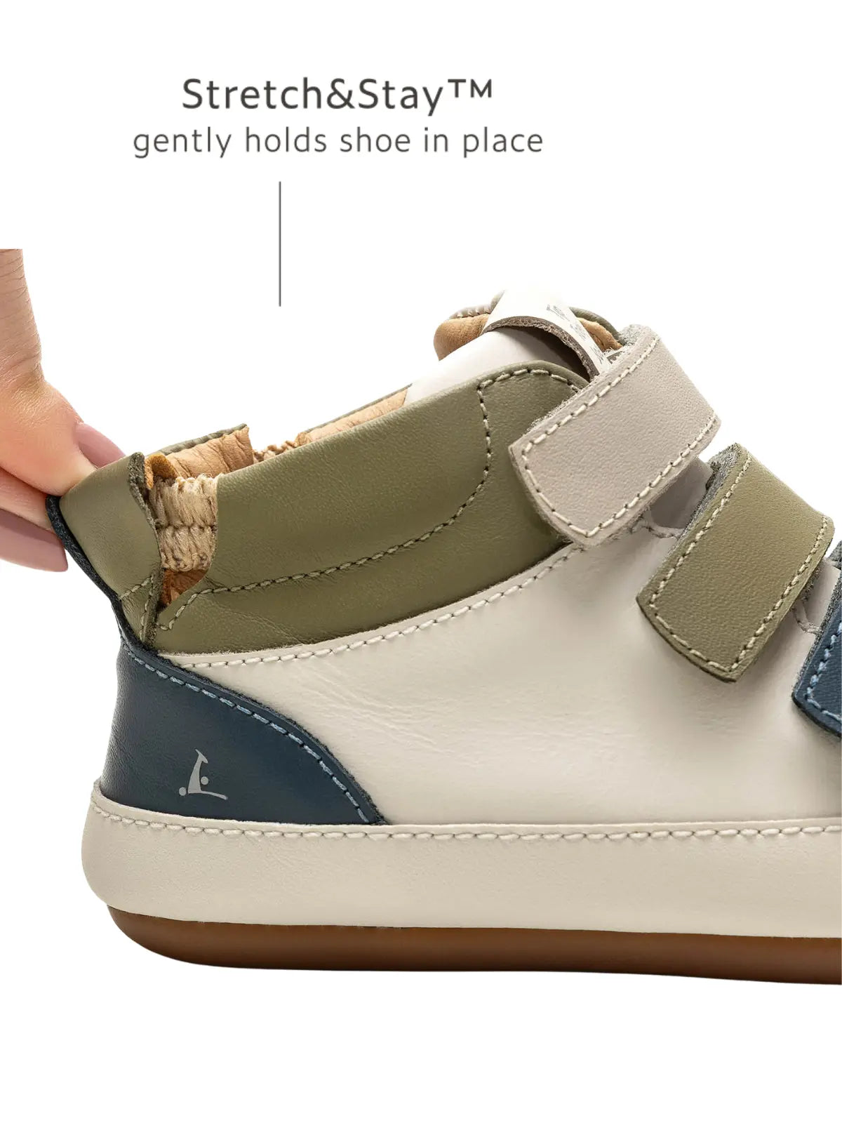 Close-up of the Stretch &amp; Stay elastic heel on the baby Metropoly sneaker for a secure and easy fit.