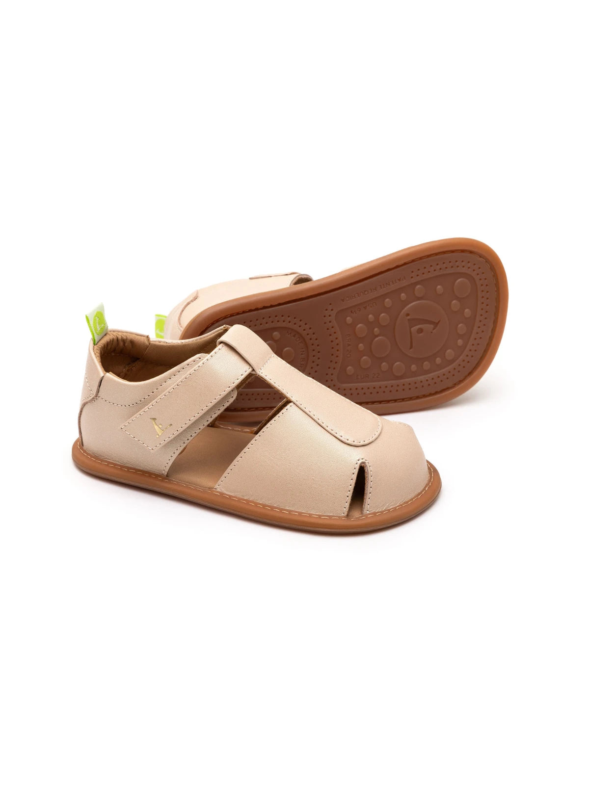 Soft candy dream pink leather baby sandals with a closed toe, adjustable strap, and flexible gum rubber sole.