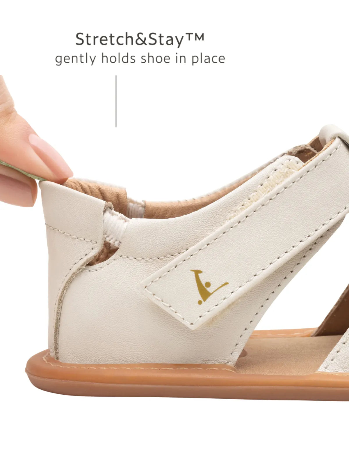 Close-up of the Stretch & Stay elastic heel on the Tapioca baby sandal, designed for a secure and easy fit.