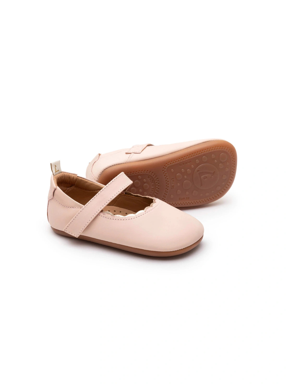 Soft cotton candy pink leather baby shoes with a scalloped edge and metallic salmon strap detail.
