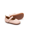 Soft cotton candy pink leather baby shoes with a scalloped edge and metallic salmon strap detail.