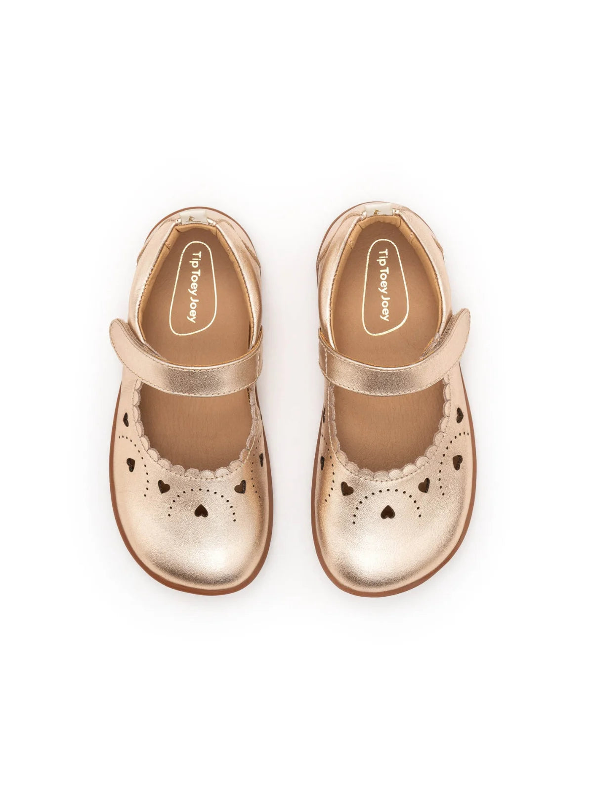 Overhead view of the metallic salmon kids shoes highlighting the wide toe box for natural foot growth.