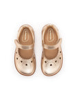 Overhead view of the metallic salmon kids shoes highlighting the wide toe box for natural foot growth.