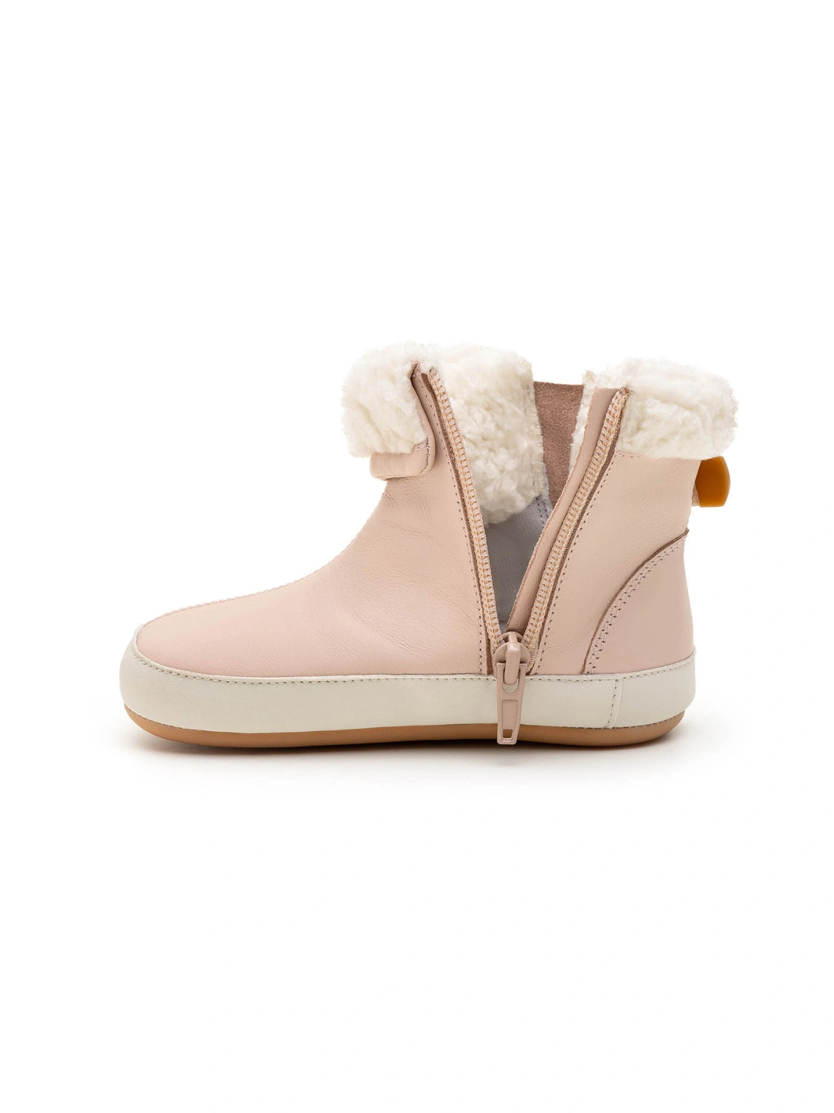 Close-up of the easy-entry side zipper and plush faux fur collar on the candy dream baby boot.