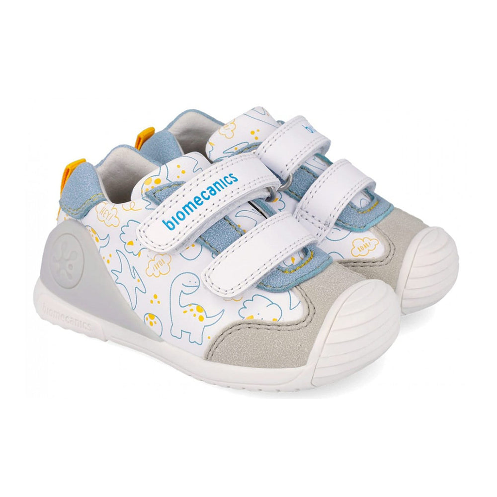 Children's shoe with dinosaur design on a white background