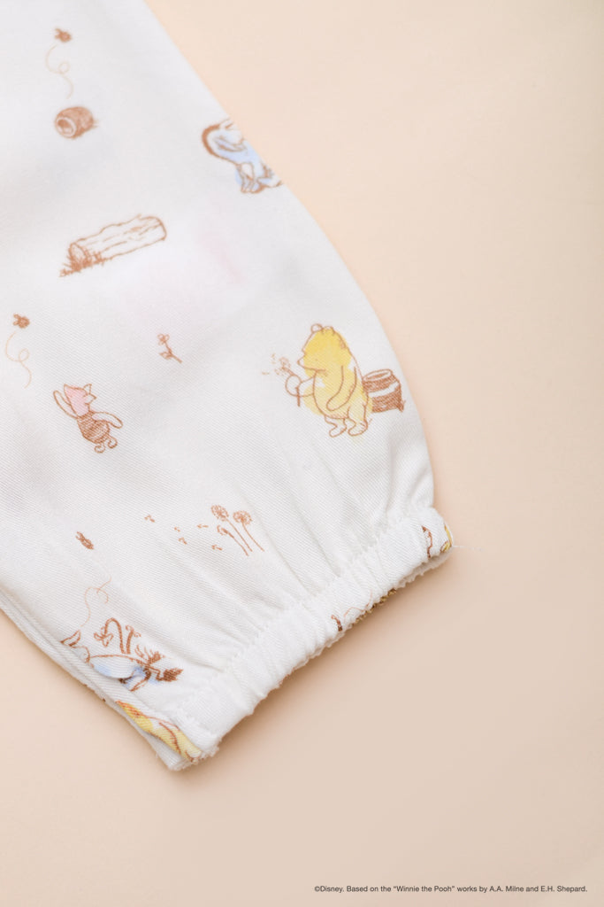 Caitlyn Romper Dandelion Pooh closeup