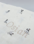 Beige Dalmatian puppy blanket with personalized name Osian