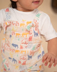 Baby in colorful elephant print Emery jumpsuit