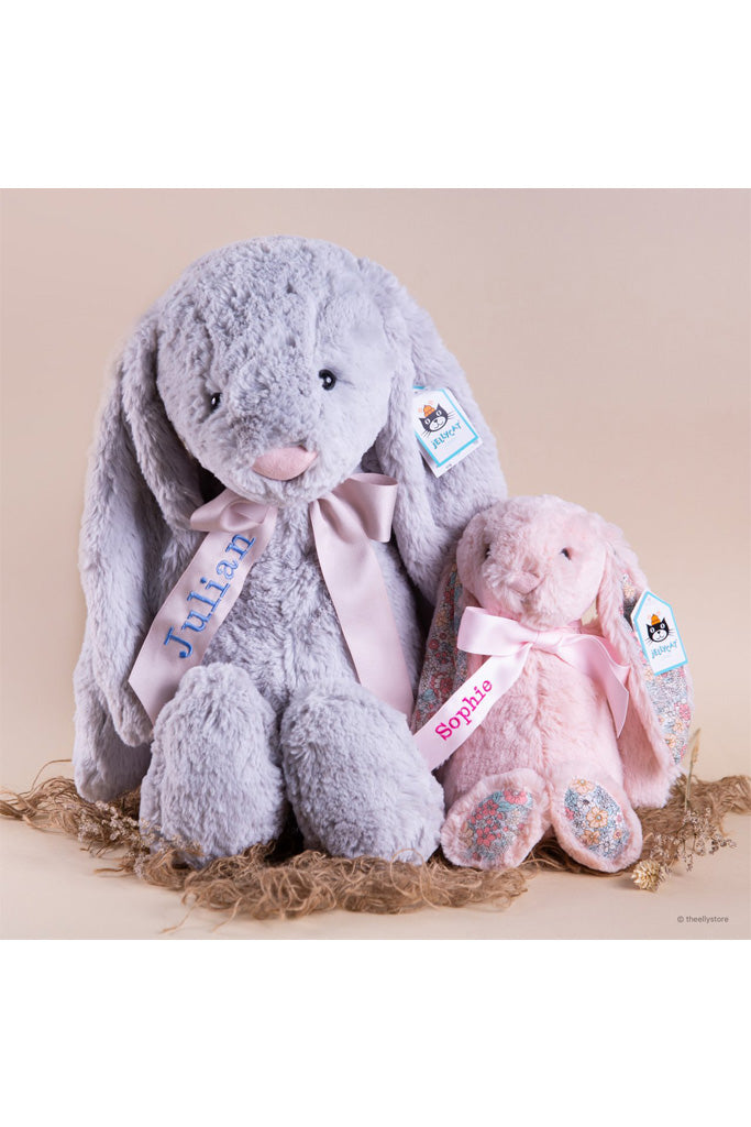 Ribbon Personalisation Sample on Bunnies - Beige Ribbon with Cornflower Blue Text and Light Pink Ribbon with Fuchsia Text