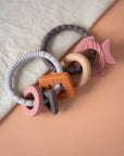 Shapes teether toy with various shapes and colors.