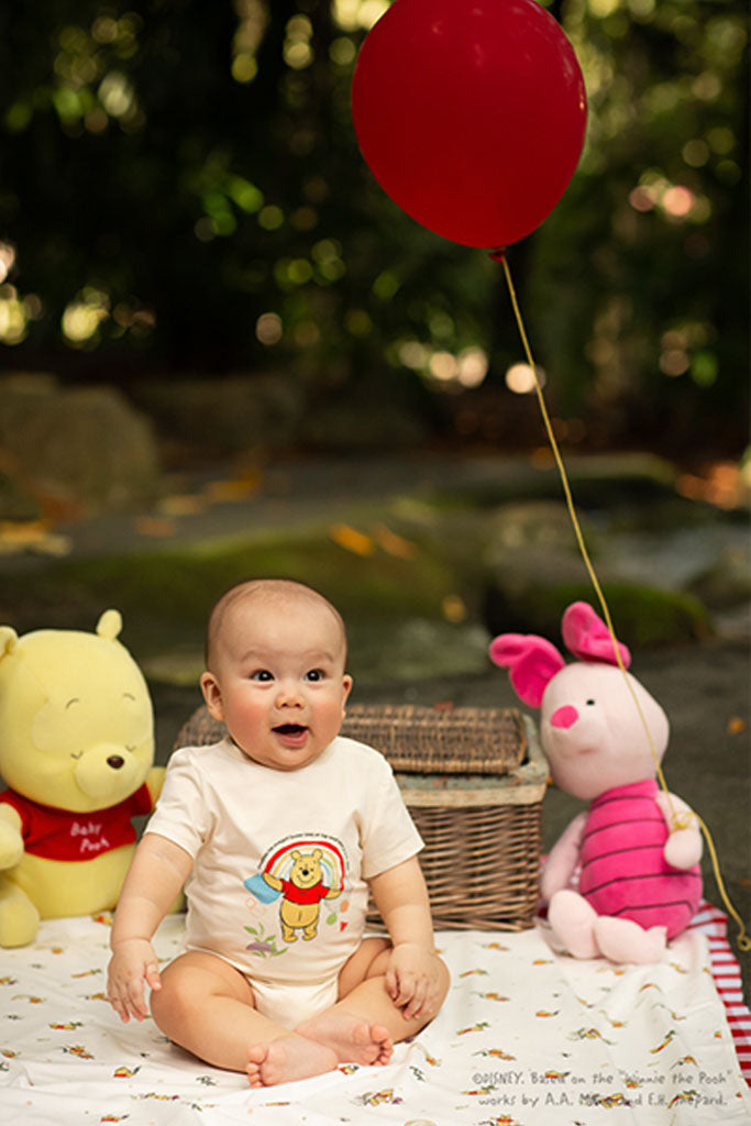 Short-Sleeve Onesie - Yellow Rainbow Pooh | Disney x elly | The Elly Store Singapore